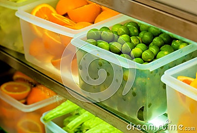 Refrigerated Fruits In The Transparent Crisper Stock Photo