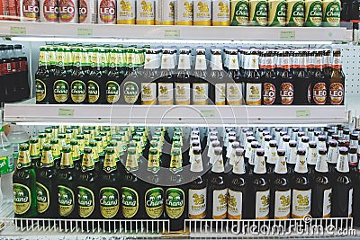 Refrigerator in a supermarket with local Thai beer brands Chang, Singha and Leo Editorial Stock Photo