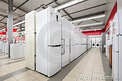 Refrigerators and washing mashines in appliance store Stock Photo