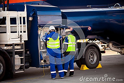 Refuelling truck preparing to refuel the aircraft Editorial Stock Photo