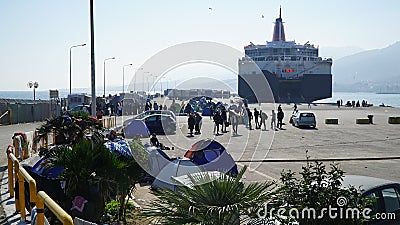 Refugees in the harbor Editorial Stock Photo