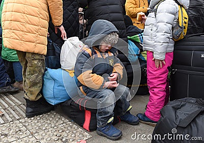 Refugees near railway station of Lviv waiting for the train to Poland Editorial Stock Photo