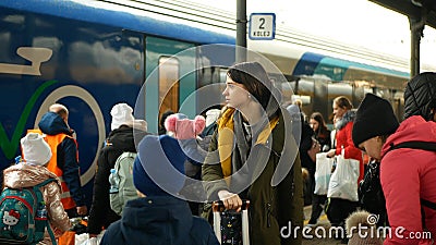 BOHUMIN, CZECH REPUBLIC, MARCH 17, 2022: Refugees Ukraine children family arriving boarding people board train Bohumin Editorial Stock Photo