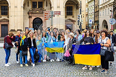Refugees from Ukraine with flag at the rally. August 24, 2022 Prague Czech Republic Editorial Stock Photo