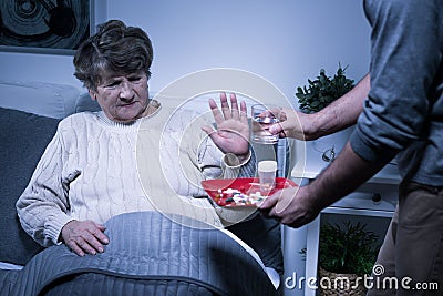 Refusing to take pills Stock Photo