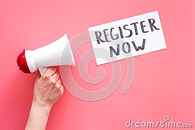 Register now hand lettering icon near megaphone on pink background top view copy space Stock Photo