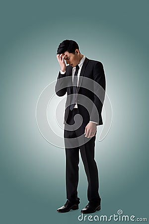 Regret young business ma Stock Photo