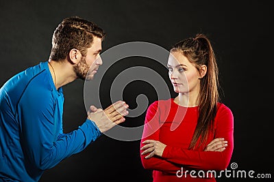Regretful man husband apologizing upset woman wife Stock Photo