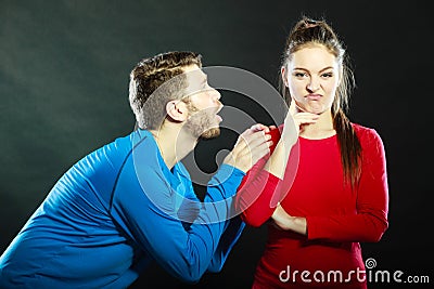 Regretful man husband apologizing woman wife. Stock Photo