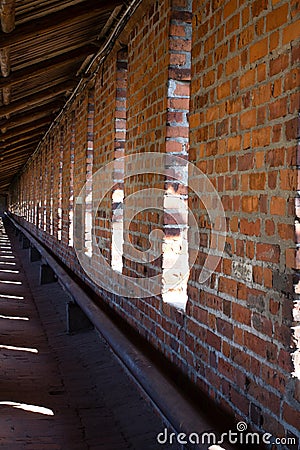 Regular pattern brick wall with windows Stock Photo