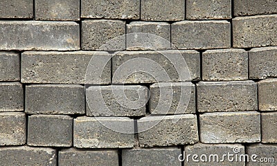 Regular shape blocks, texture, background. Paving slabs of gray blocks of flat shape, close-up. Pavement blocks in city park Stock Photo
