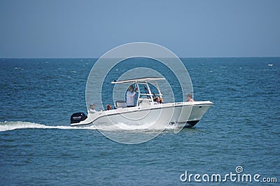 Rehoboth Beach, Delaware, U.S - August 12, 2023 - A white boat moving on the bay Editorial Stock Photo