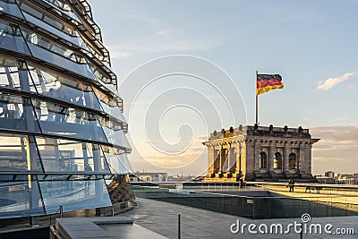 Reichstag glass dome of the Parliament in Berlin (Bundestag) with German flag Editorial Stock Photo
