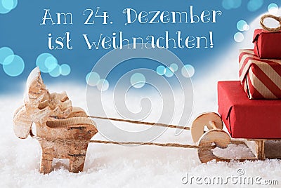 Reindeer, Sled, Light Blue Background, Weihnachten Means Christmas Stock Photo