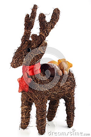 Reindeer with sweets on his back Stock Photo