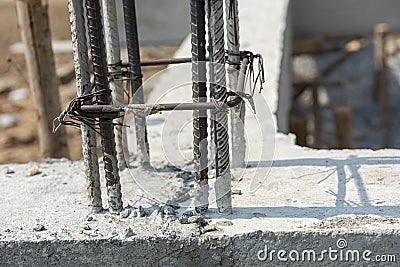 Reinforce iron cage for a house column in a construction site. Stock Photo