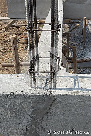 Reinforce iron cage for a house column in a construction site. Stock Photo