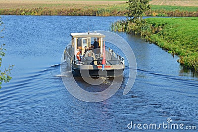 The Reitdiepveer with passengers, sailing over the Reitdiep in Groningen Editorial Stock Photo