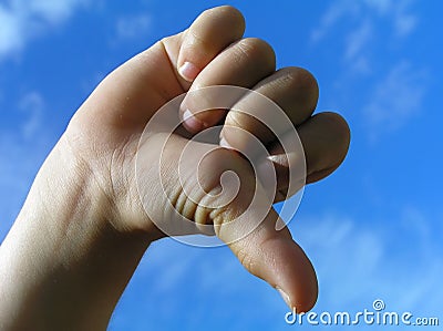 Rejection gesture – child hand Stock Photo