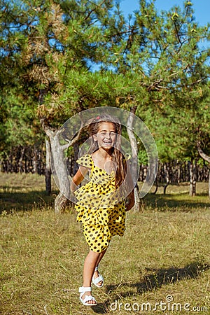 Rejoicing happy little girl Stock Photo