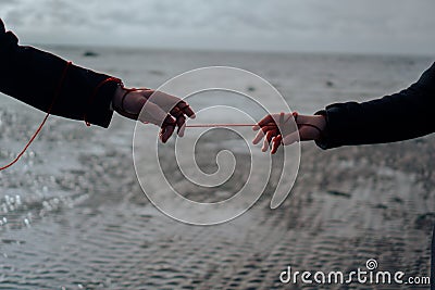 related destinies. the red thread of fate Stock Photo