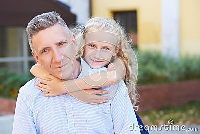 Relations. Dad. Daughter. Heat. Family. Love. Gentle embrace Stock Photo