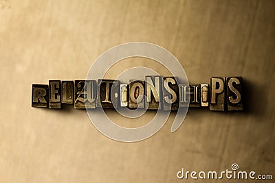 RELATIONSHIPS - close-up of grungy vintage typeset word on metal backdrop Cartoon Illustration