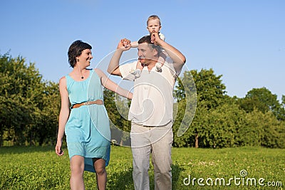 Relationships Concepts. Young Caucasian Family of Three People Having Good Time Stock Photo