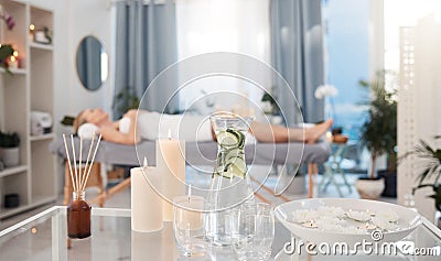 Relax and enjoy your stressless day with us. Closeup shot of various pampering essentials on a table in a spa with a Stock Photo