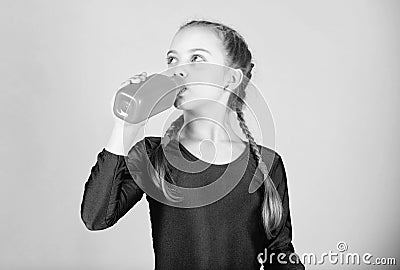 Relax after gym workout of teen girl. Resting time. Childhood activity. Sport and health. Little girl drink water from Stock Photo