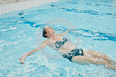 Relax, wellness and woman swimming in water at retirement home calm, peaceful and floating. Health, fitness and peace of Stock Photo