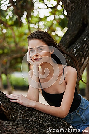 relax woman lifestyle sky vacation beauty sea sitting nature tree smiling Stock Photo