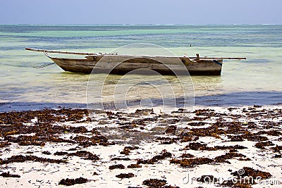 Relax of zanzibar coastline boat pirague in the blue lagoon Stock Photo