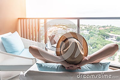 Relaxation healthy living lifestyle summer holiday vacation of freelancer woman take it easy resting in comfort chair in resort Stock Photo