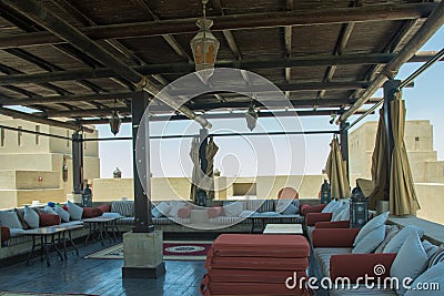 Relaxation lounge in the restaurant on the roof with comfortable sofas Stock Photo