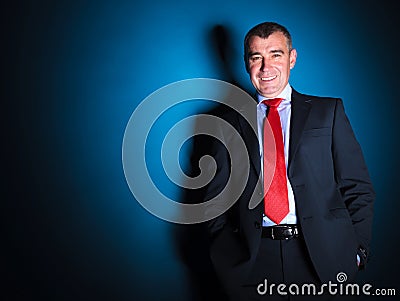 Relaxed happy business man posing Stock Photo