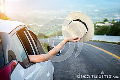 Relaxed happy traveler, Young beatiful asian gilr holding hat we Stock Photo