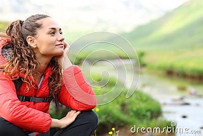 Relaxed hiker resting contemplating in nature Stock Photo
