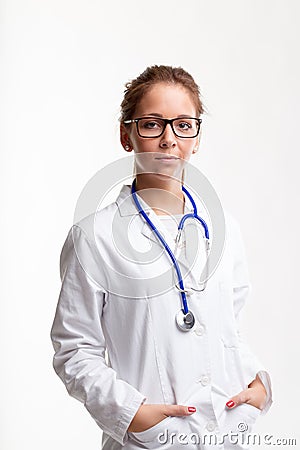 Relaxed thoughtful young woman doctor Stock Photo