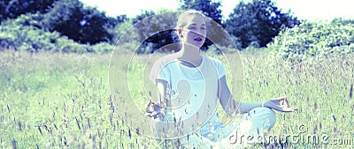 Relaxed yoga girl for openness and mindfulness, soft contrast effects Stock Photo