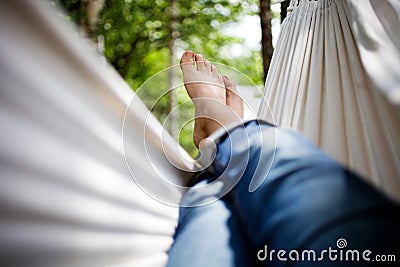Relaxing in hammock Stock Photo