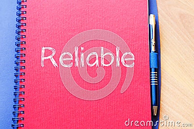 Reliable write on notebook Stock Photo