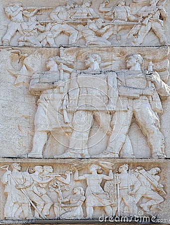 Relief above the Council of Ministers glorifies socialist victory in all fields, Tirana Stock Photo