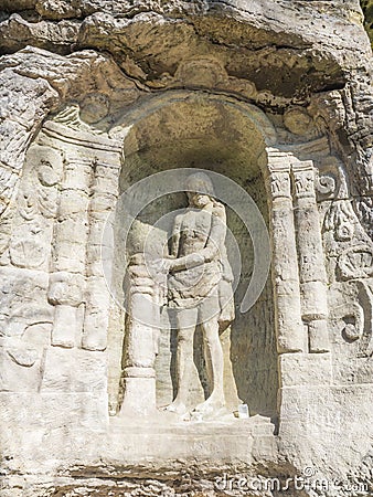 Relief of Christ after flogging sculpted to the sandstone rock in 18th century near village Radvanec in luzicke hory Stock Photo