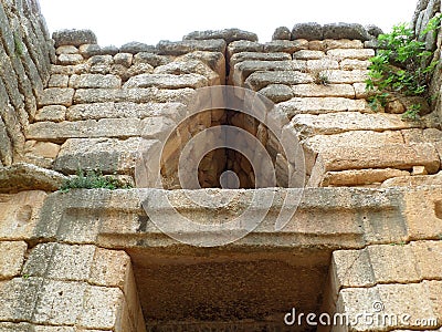 Relieving Triangle above the Doorway of the Beehive Tomb, Treasury of Atreus, Mycenae in Greece Stock Photo