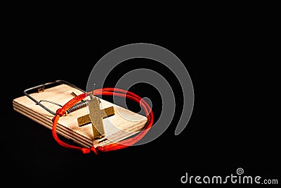 Religion and the danger associated with this. A conceptual photo of the dangers of manipulating various faiths over a person Stock Photo