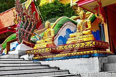 Religion. Golden Praying Buddhist Monk Statues, Buddha Temple, T Stock Photo