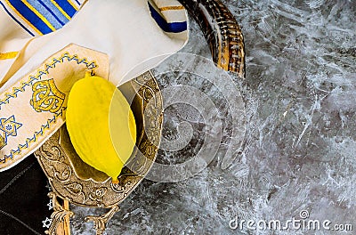 Religion jewish celebration holiday Sukkot. Etrog, lulav, hadas arava kippah and shofar tallit praying book Stock Photo