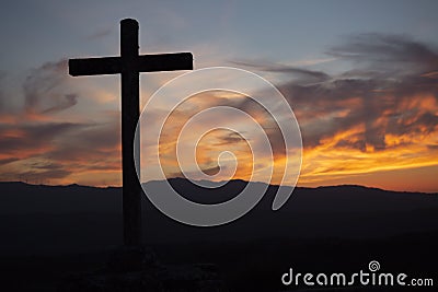 Religion theme, catholic cross and sunset Stock Photo