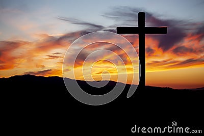 Religion theme, catholic cross and sunset Stock Photo